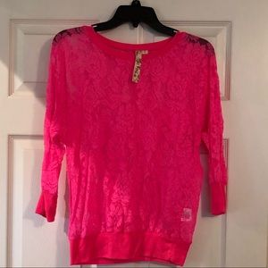 Hot pink sheer shirt.